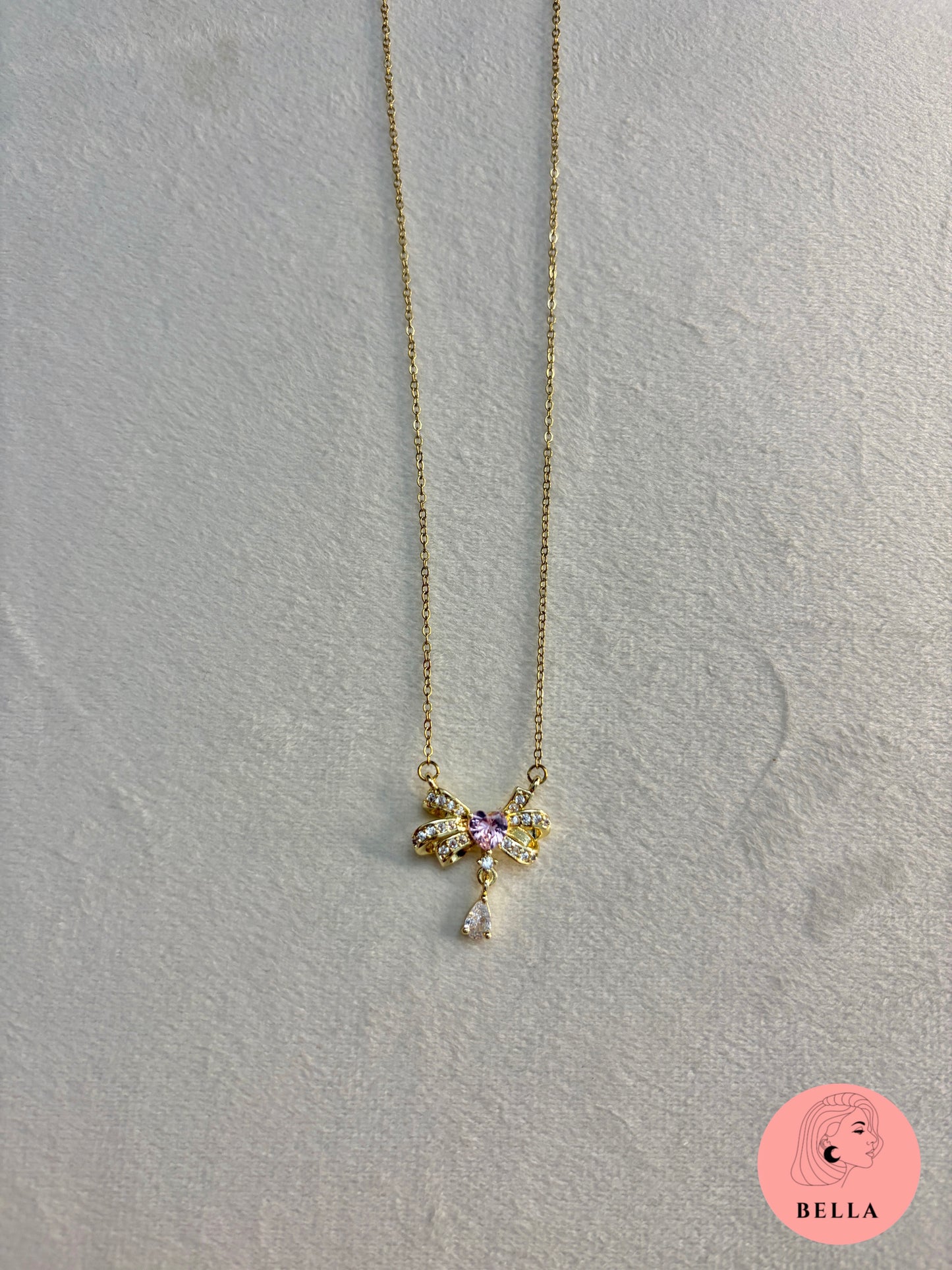 Bow pink stone necklace